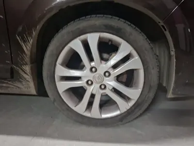 Suzuki Liana A6
